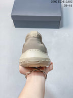 Rear view of the taupe sandal showing the heel and outsole.