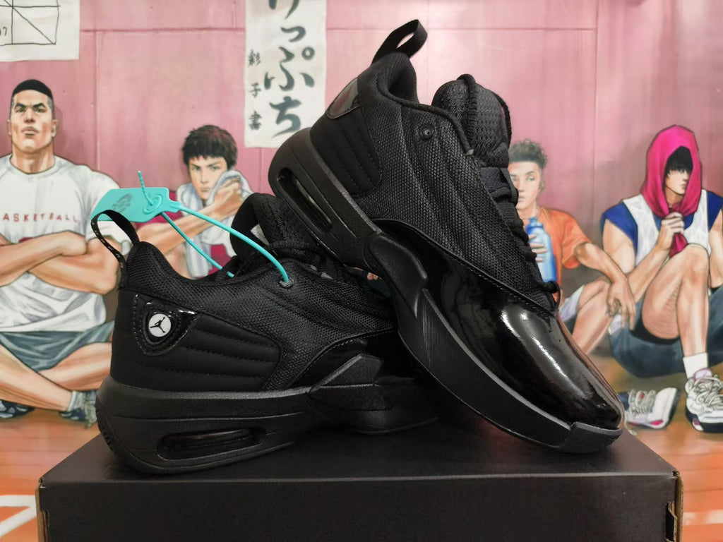 Pair of black Jordan basketball shoes shown from the side and front.