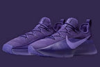 Pair of purple low-top lace-up sneakers shown against a dark purple background.