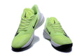 Pair of volt yellow-green Nike basketball shoes with black Swoosh details, viewed from the front.