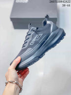 Side profile of the dark gray ECCO sneaker highlighting the mesh-textured upper, layered panels, and rugged sole.