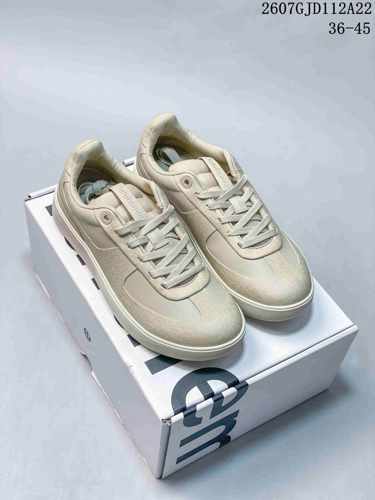 Pair of light neutral lululemon Cityverse low-top sneakers displayed on a shoebox, with the style code and EU size range visible above.