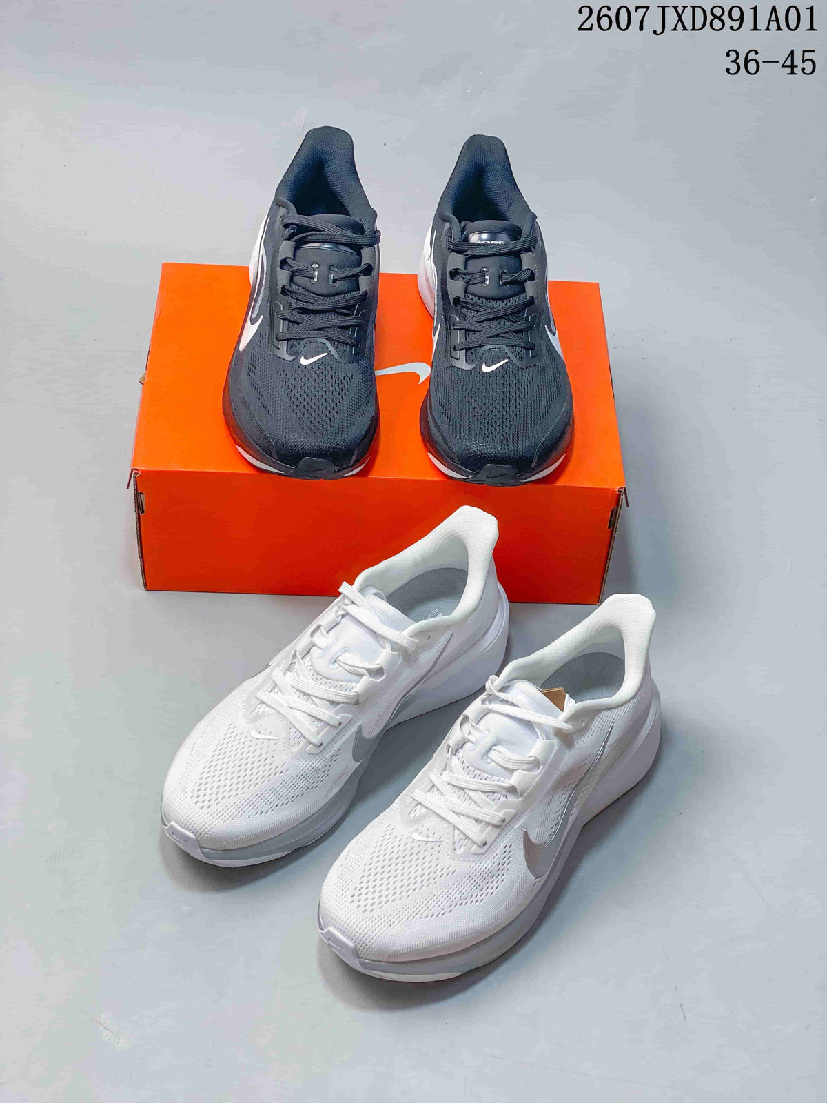 Dark gray and white Nike Air Zoom Pegasus 42 shoes shown together.