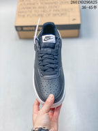 Top view of the sneaker showing the perforated toe, dark laces, and Court Vision tongue label.
