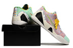 Pastel multicolor shoes displayed on a black shoebox.