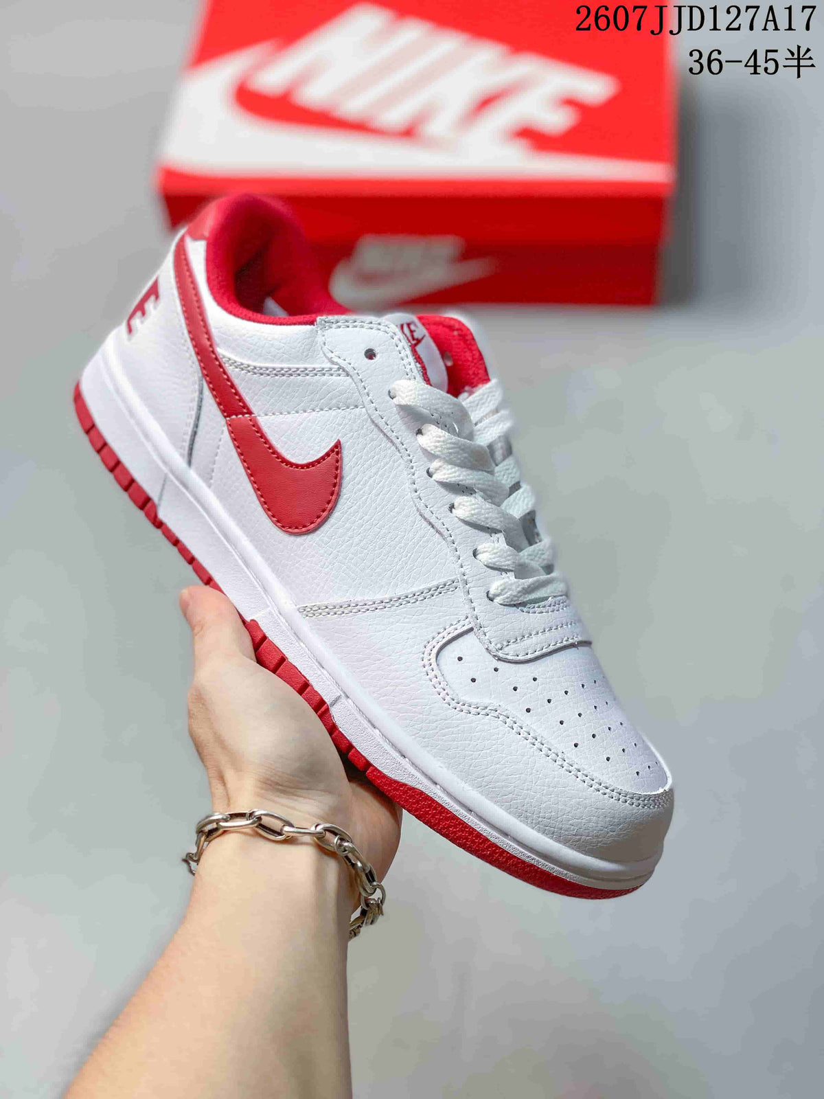White and red Nike SB Dunk Low Pro sneaker with red Swoosh, collar accents, and outsole.