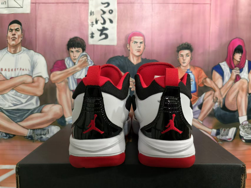 Rear view of white, black, and red Jordan Flight basketball sneakers