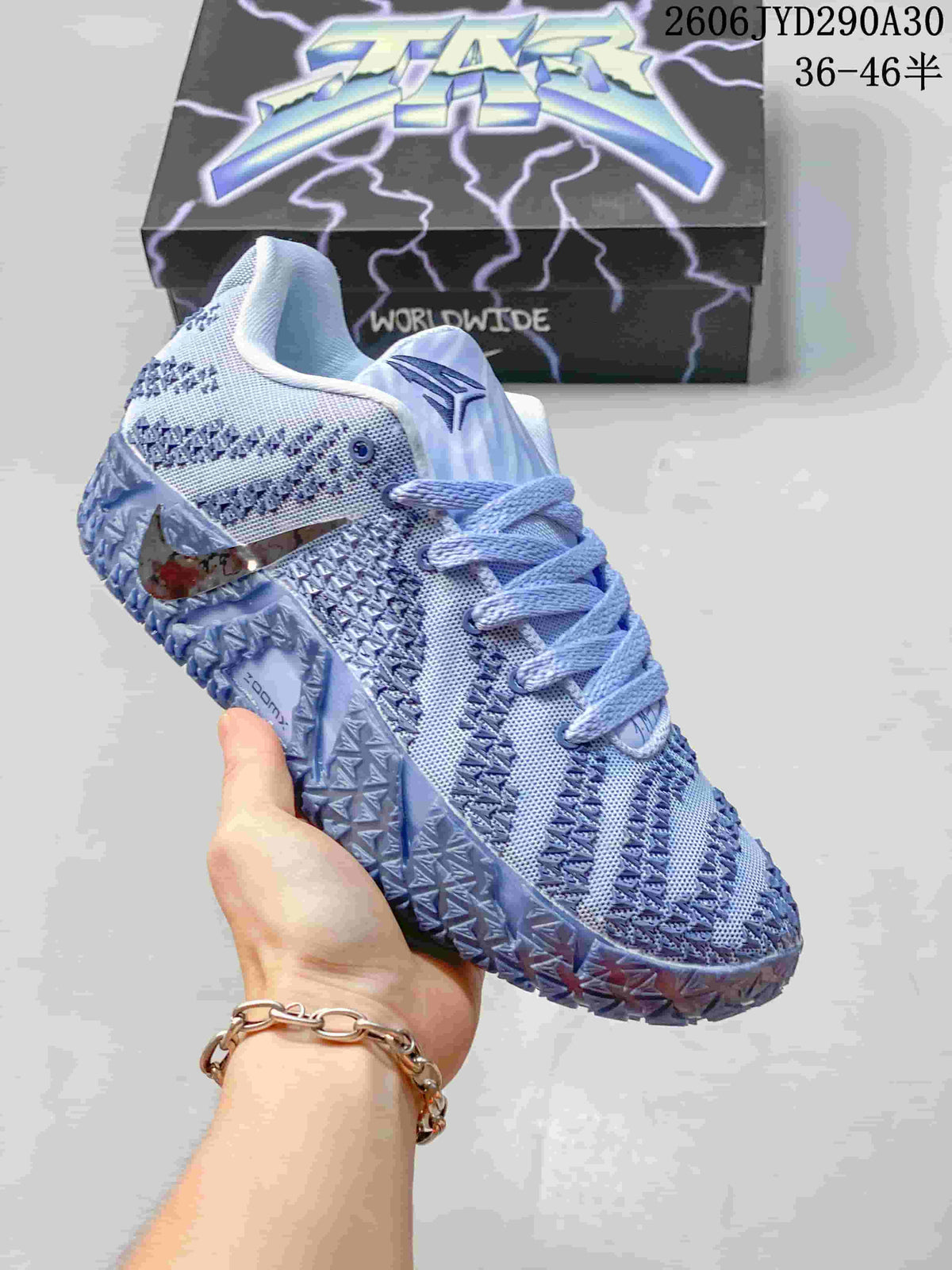 Light blue and lavender Nike Ja 3 basketball shoe