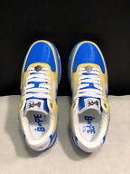 Top view of blue and yellow BAPE STA sneakers with white laces and perforated toe panels