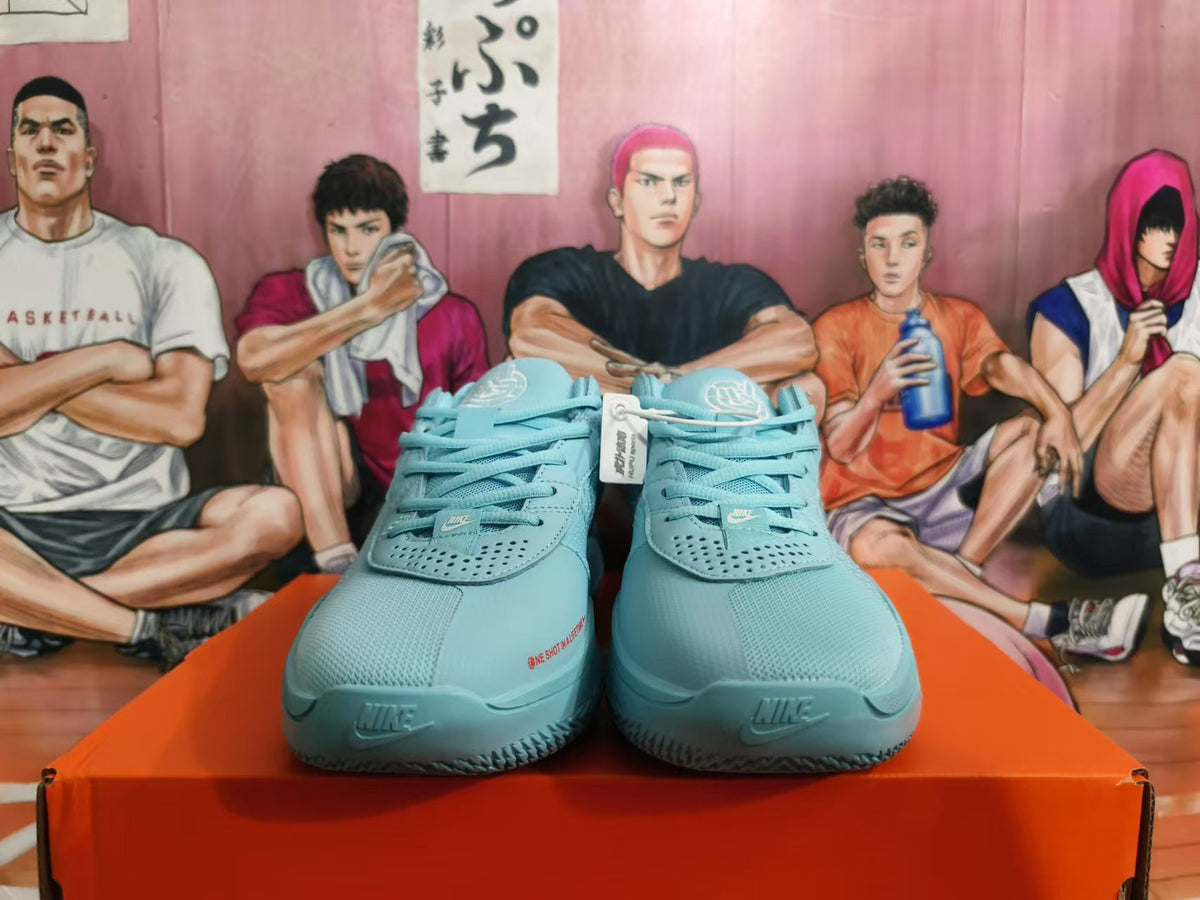 Front view of blue Nike basketball shoes with mesh uppers, laces, and Swoosh logos.