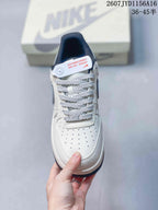 Top view showing the perforated toe box, woven laces, tongue label and contrasting trim.