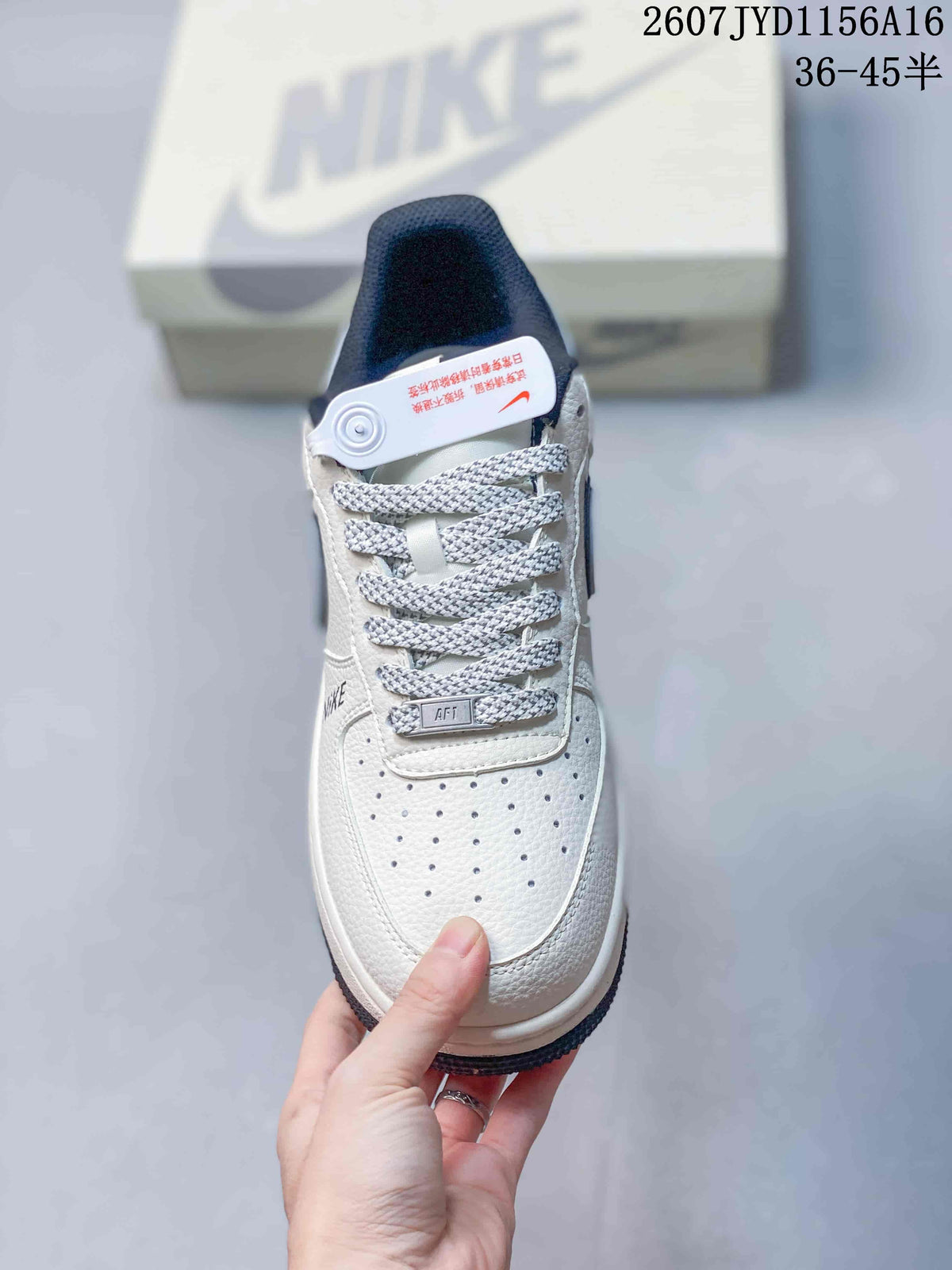 Top view showing the perforated toe box, woven laces, tongue label and contrasting trim.