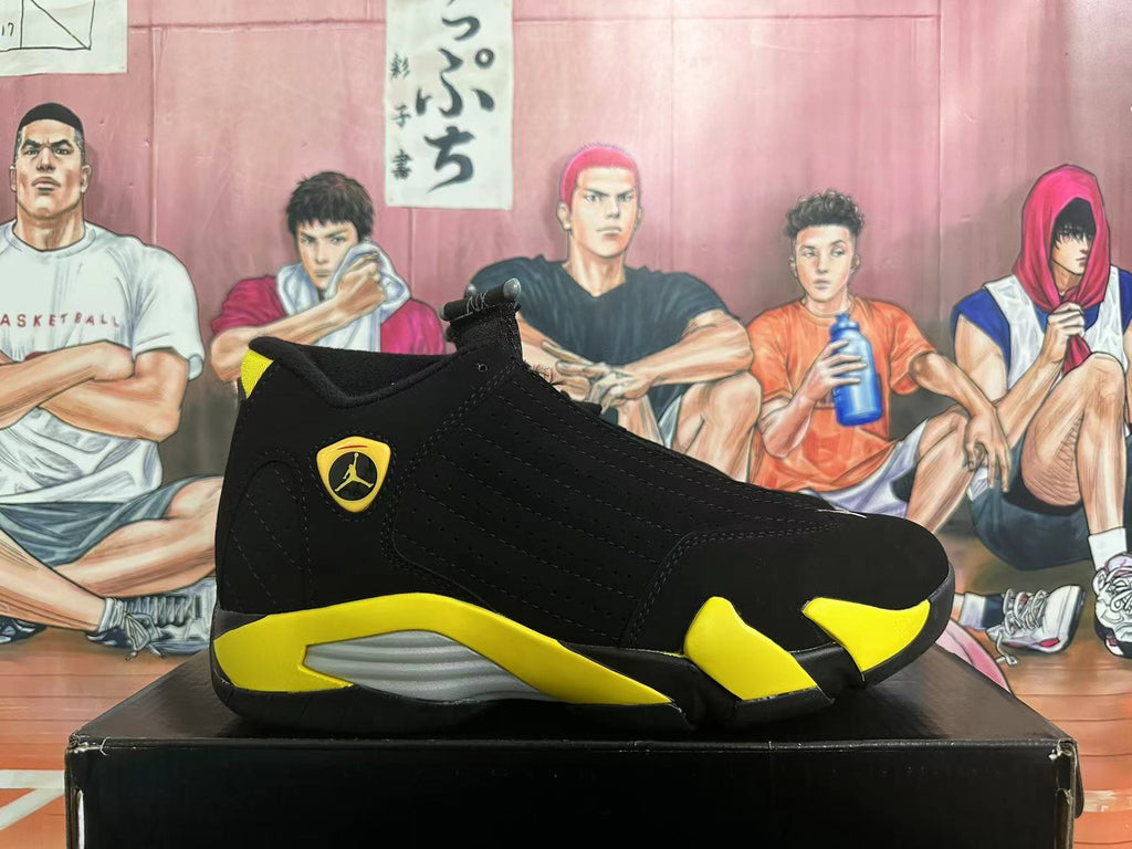 Side profile of a black and yellow Jordan high-top sneaker
