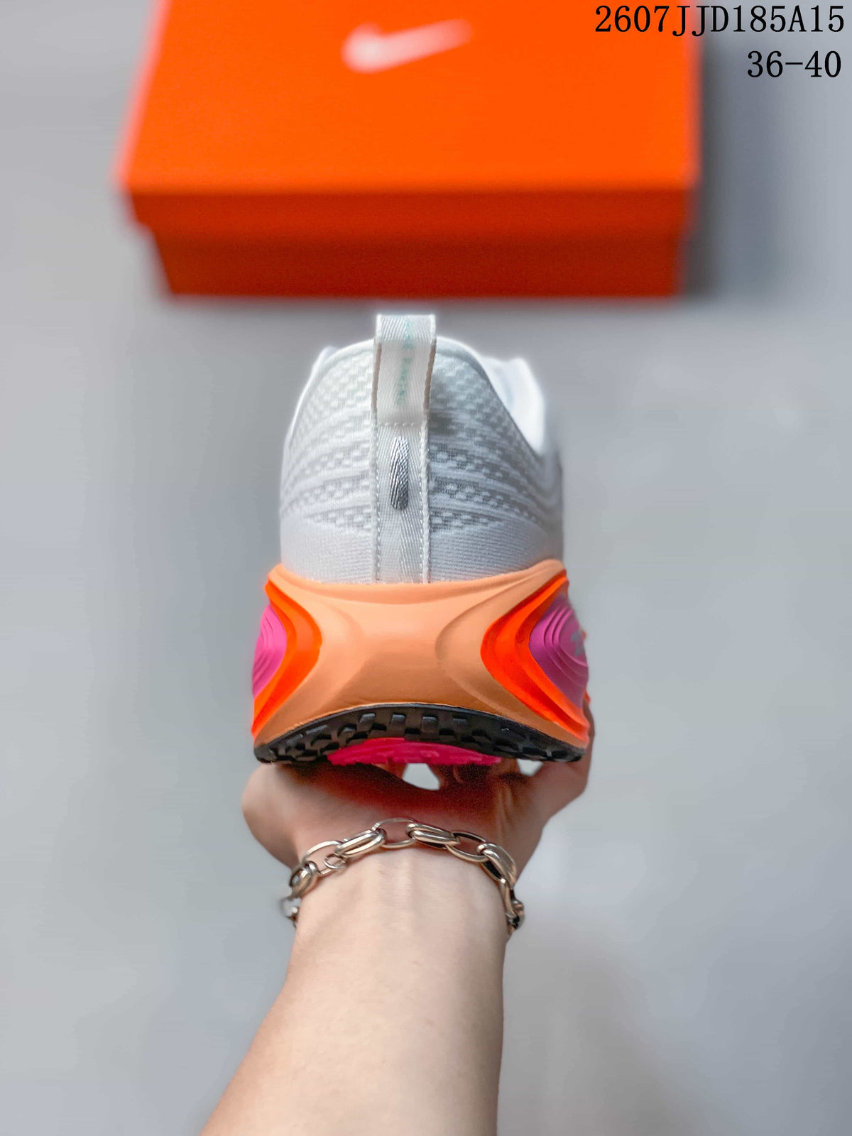 Rear view showing the padded heel, pull tab, and layered orange and pink midsole.