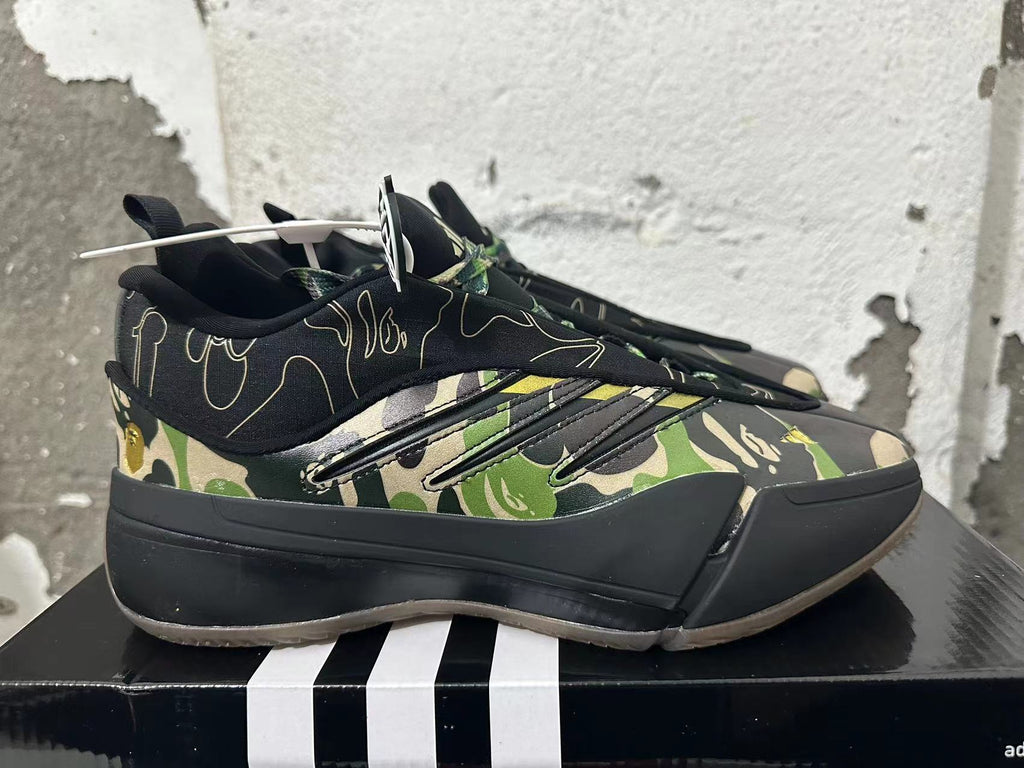 Side profile showing camouflage panels, three stripe details, and a dark sculpted sole.