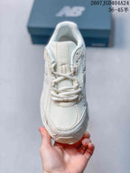 Top view of the beige sneaker showing the mesh toe box, tongue and lace system.