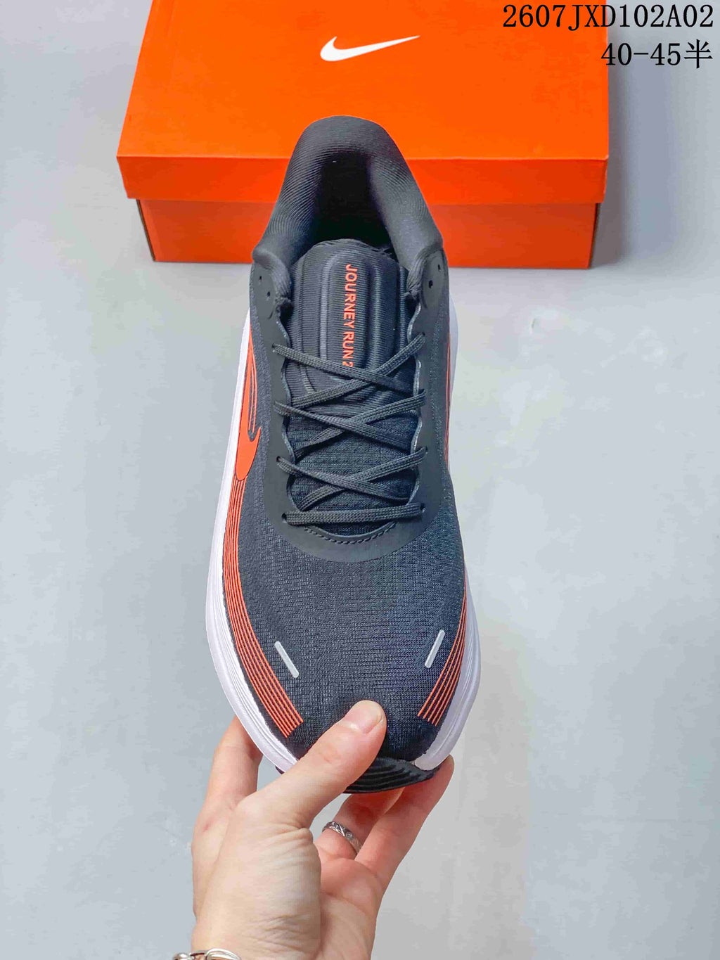 Top view of the lace-up front and tongue label