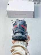 Rear view of the gray shoe showing the heel and outsole