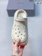 Top view of the clog sandal showing the perforated toe area, heel strap, and visible Balenciaga branding.