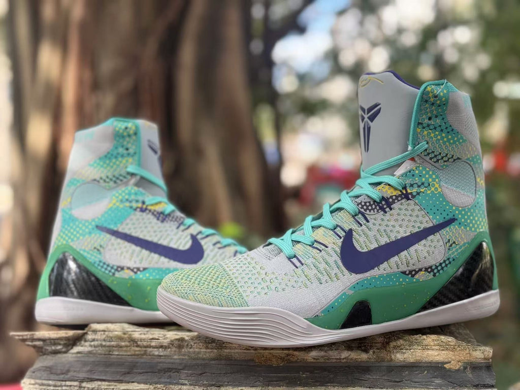 Pair of Nike Kobe 9 high-top shoes in a colorful patterned design