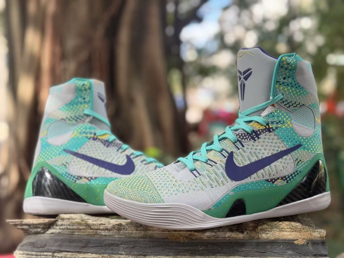 Pair of Nike Kobe 9 high-top shoes in a colorful patterned design