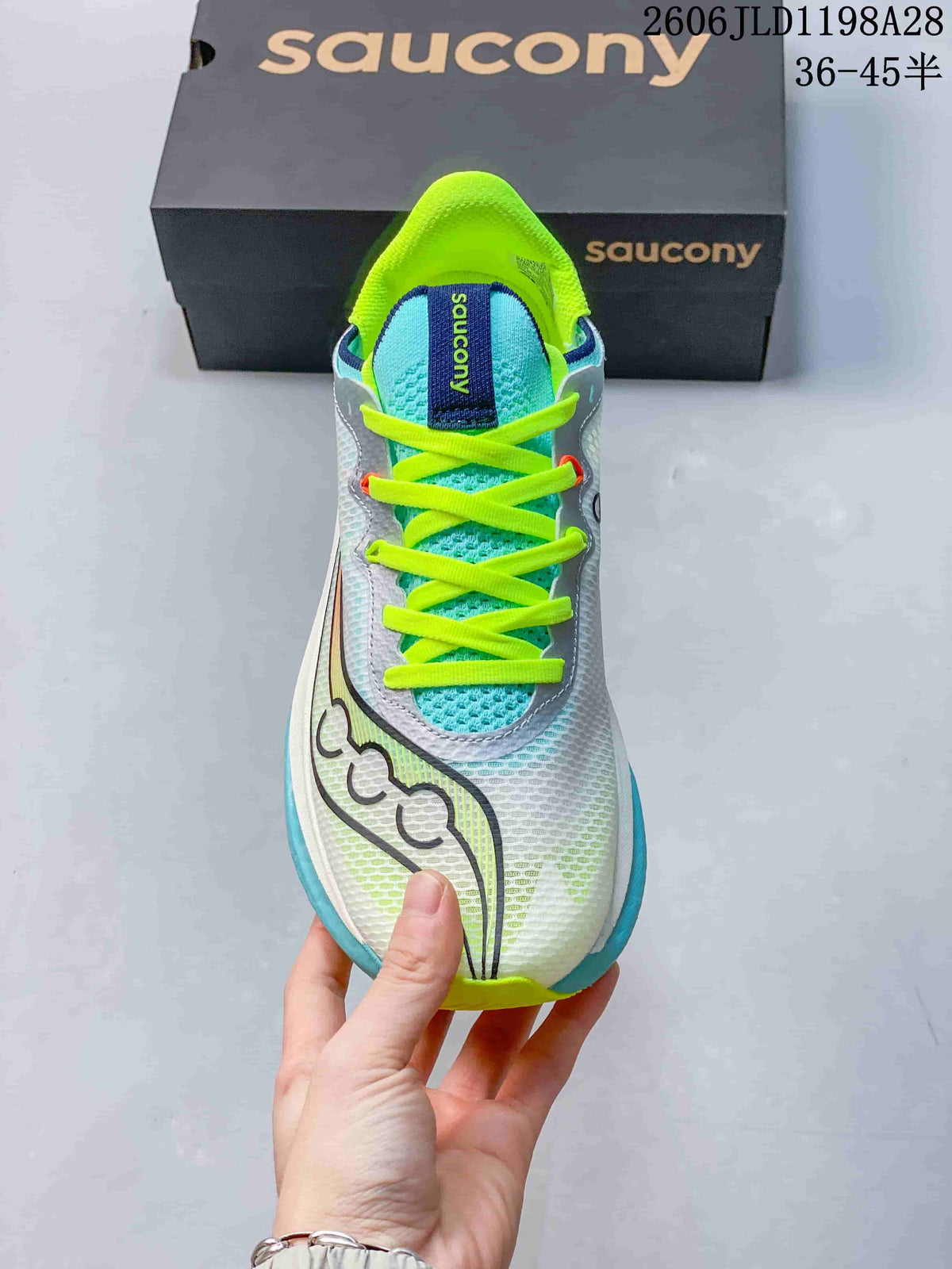 Top view of the Saucony running shoe showing its lace-up front and bright accents
