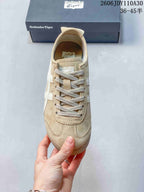 Top view of a beige Onitsuka Tiger sneaker with gray laces and white side stripes