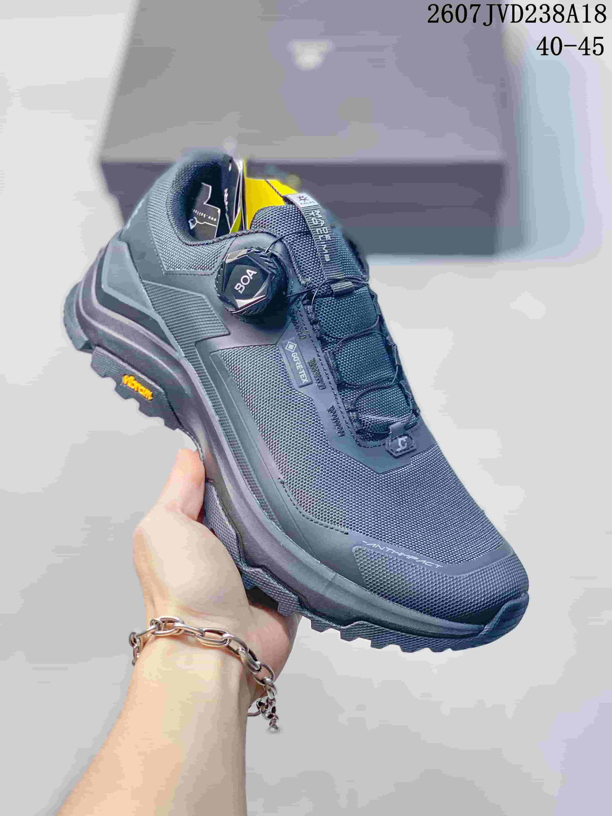 Angled close-up of the dark gray KAILAS hiking shoe showing the dial closure, structured upper and rugged outsole.