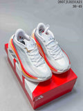 Pair of white and grey Adidas Hyperboost EDGE sneakers with red and yellow side accents displayed on a red Adidas shoebox.