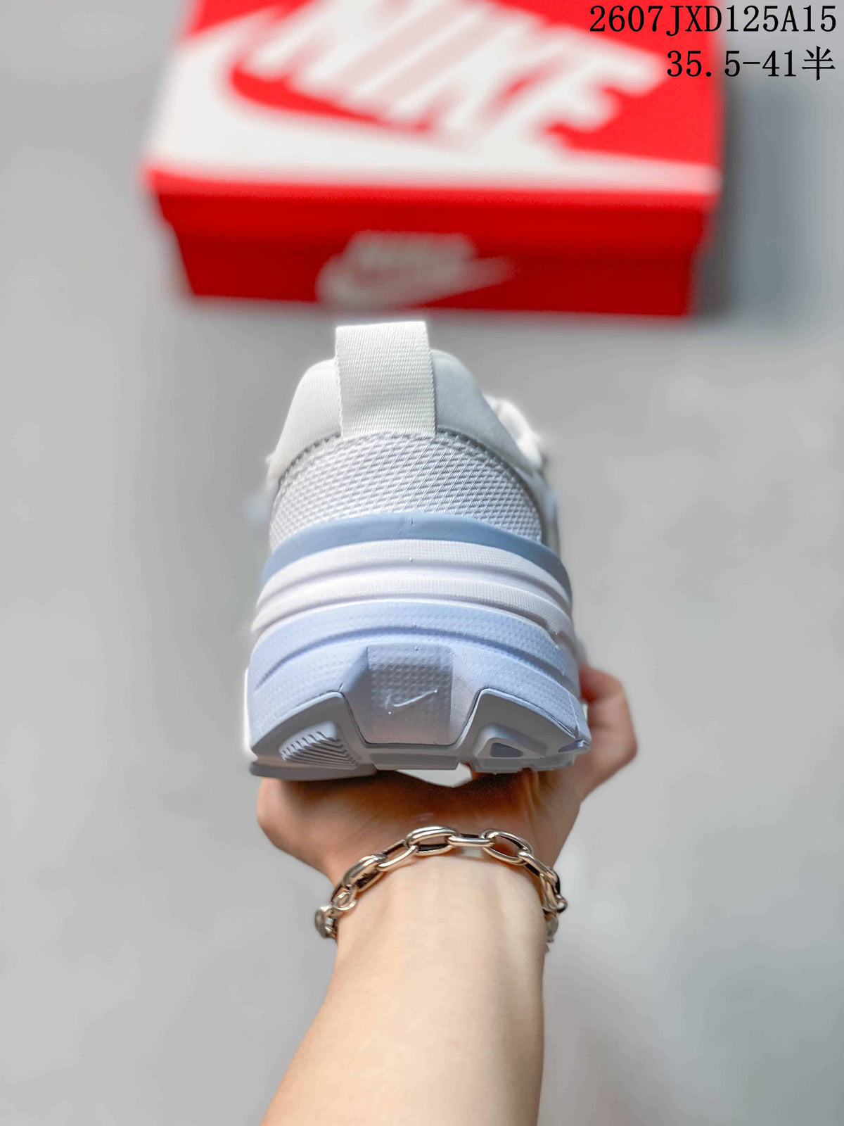 Rear view showing the mesh heel panel, padded collar, and layered sole.