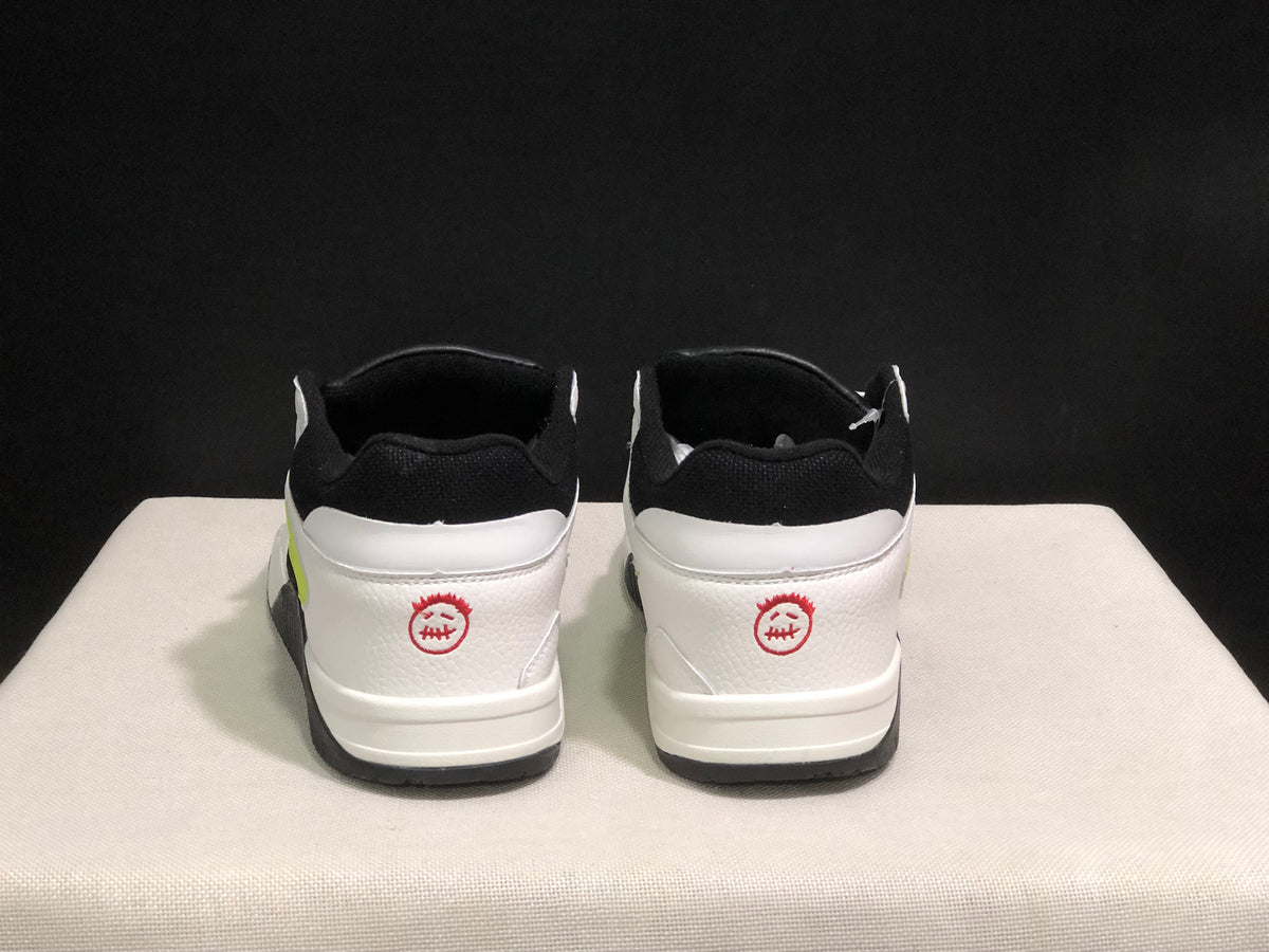 Rear view showing black collars, white heels, and red circular heel graphics.