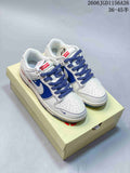 Several white low-top sneakers with blue or gray accents and patterned panels shown from above.