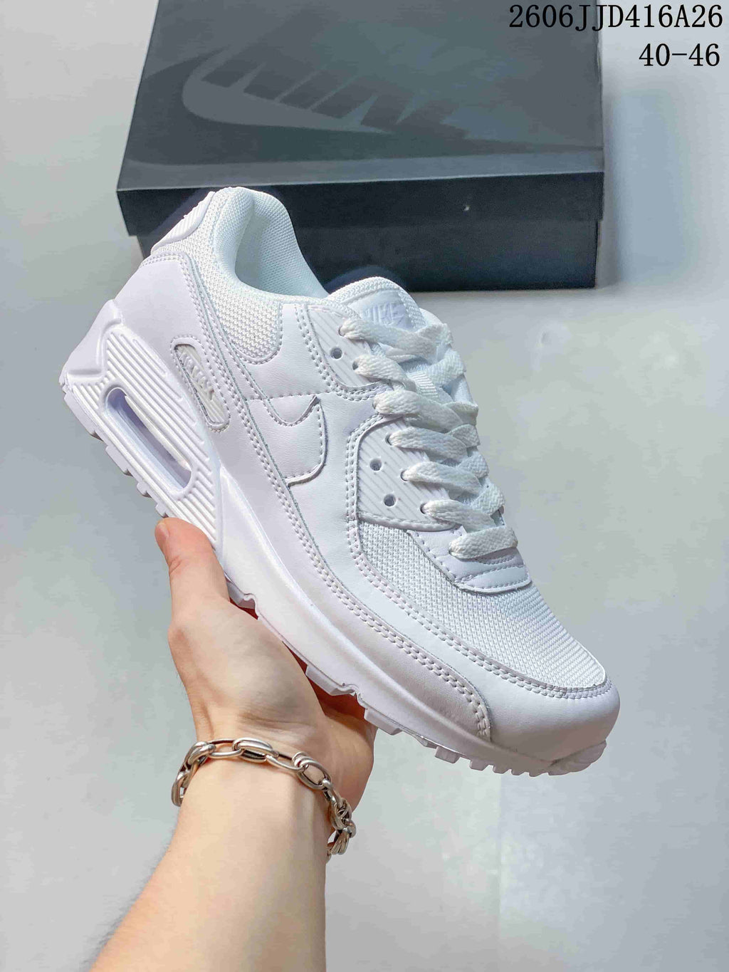 White Nike Air Max 90 sneaker with a visible heel air unit