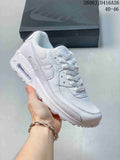 White Nike Air Max 90 sneaker with a visible heel air unit