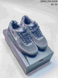 Pair of gray Nike Air Max 90 sneakers displayed on a shoebox, with the printed range 40–46 visible at the top right.