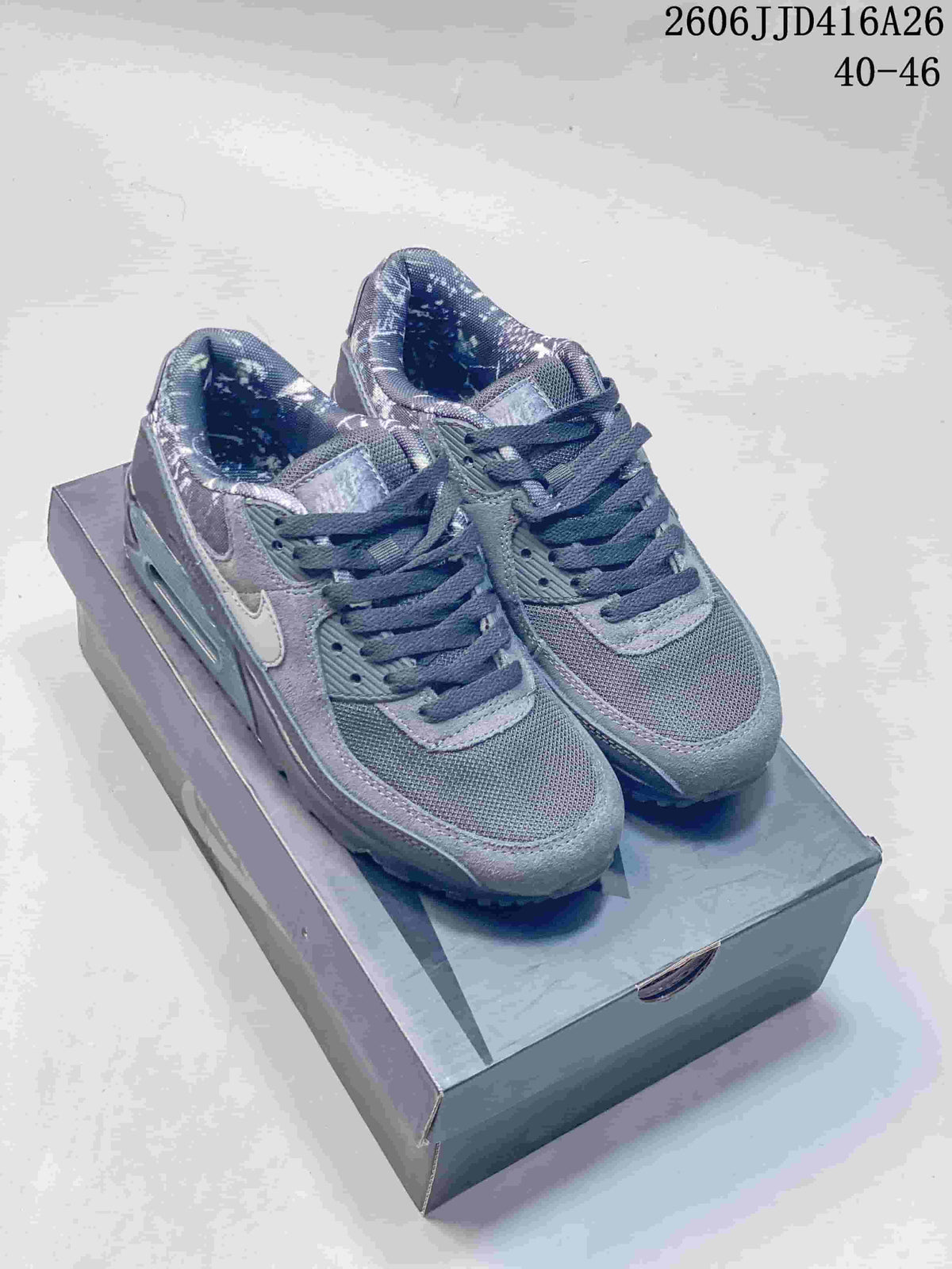 Pair of gray Nike Air Max 90 sneakers displayed on a shoebox, with the printed range 40–46 visible at the top right.