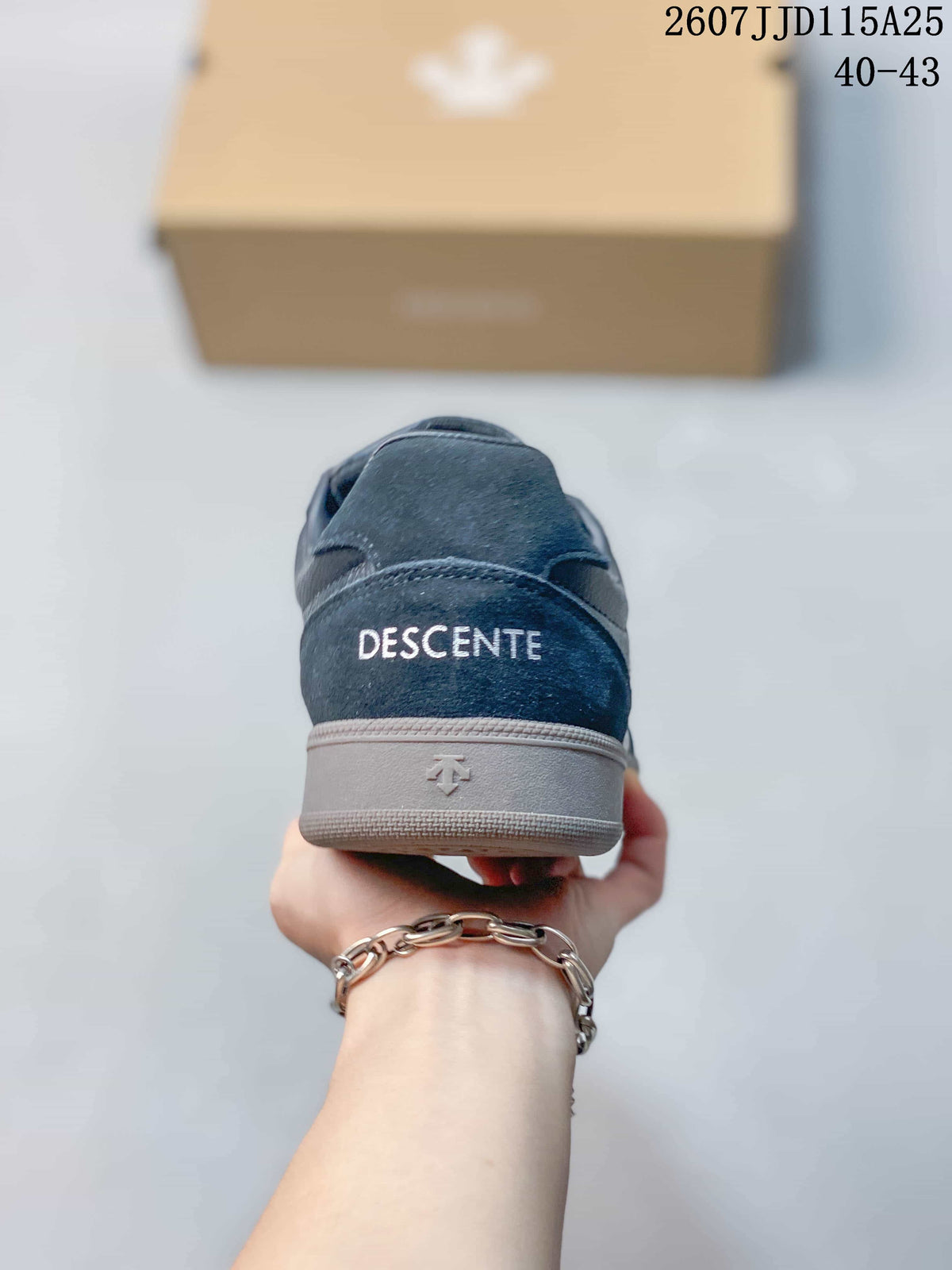 Rear view of the sneaker showing Descente branding on the heel and the contrasting outsole.