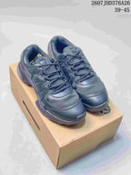 Pair of black ECCO sneakers displayed on a shoebox, with the style code and size range visible at the top.