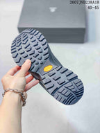 Close-up of the hiking shoe outsole showing a deep lug tread and a visible Vibram logo.
