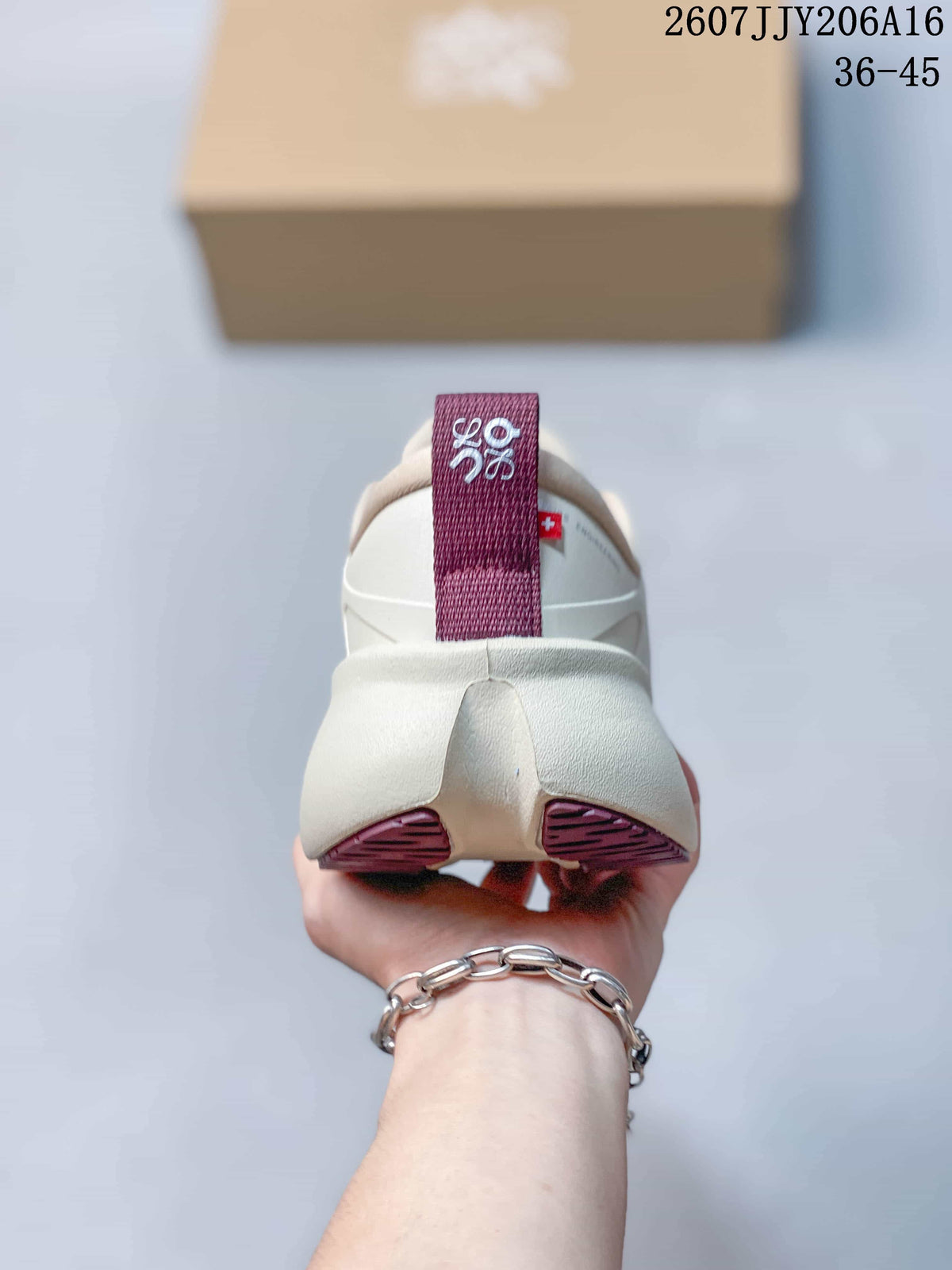 Rear view of the sneaker showing the padded heel and burgundy pull tab.