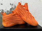 Orange Adidas basketball sneakers displayed at an angle, showing their cage-style sides and sculpted soles.