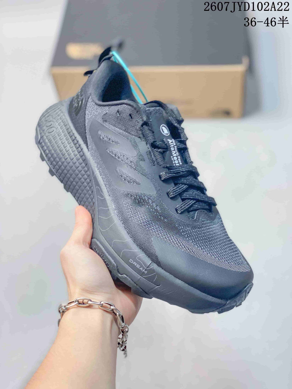 Three-quarter side view of the dark gray The North Face Altamesa 500 sneaker.