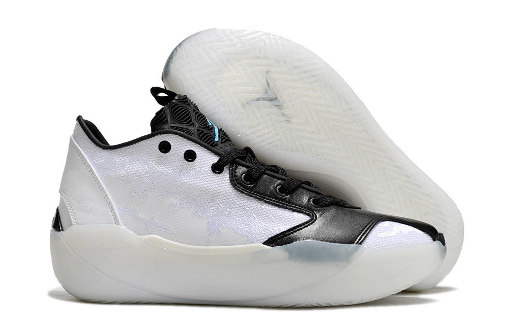 Side view of white and black Jordan Luka 39 shoes with outsole visible