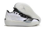 Side view of white and black Jordan Luka 39 shoes with outsole visible