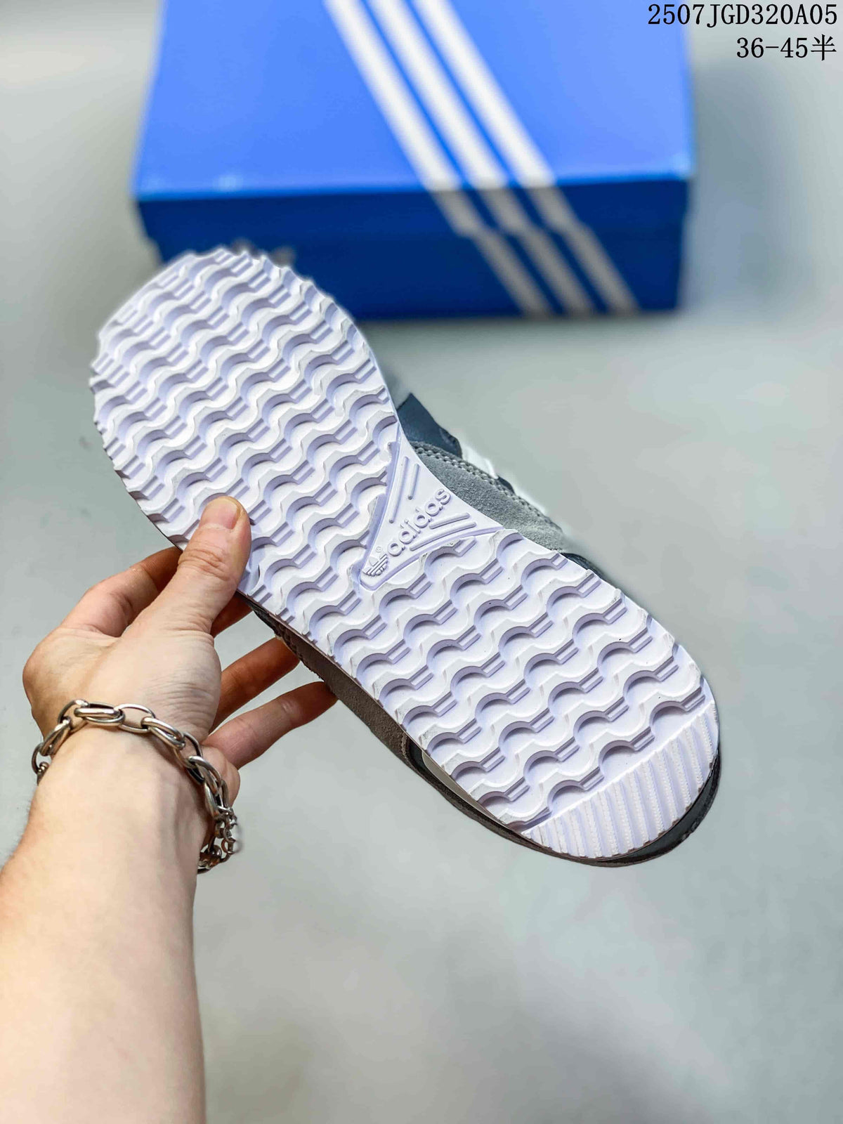 Close-up of the patterned outsole on a grey adidas ZX 750 sneaker.
