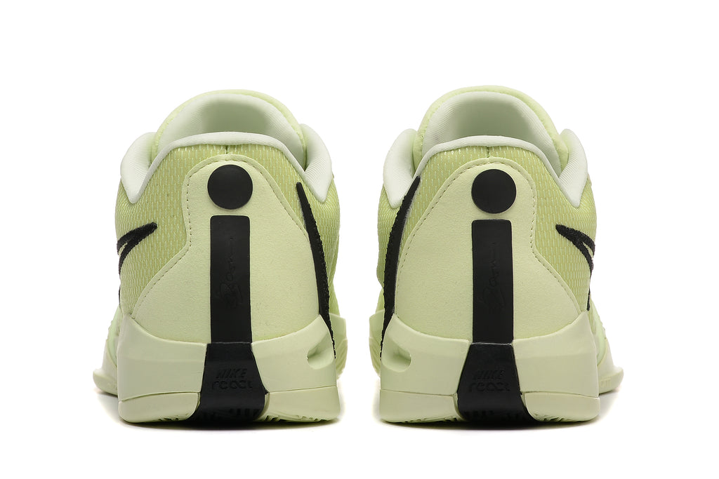 Rear view of the pale yellow-green Nike Sabrina 10 shoes