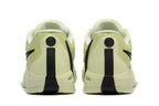 Rear view of the pale yellow-green Nike Sabrina 10 shoes