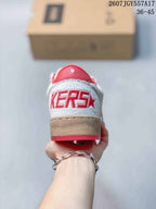 Rear view of the sneaker showing the red padded collar, textured heel panel and Ball Star lettering.