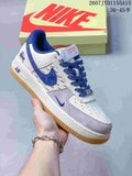 White Nike Air Force 1 sneaker with lavender-grey panels, blue swoosh details, blue patterned laces, and a gum-colored outsole.
