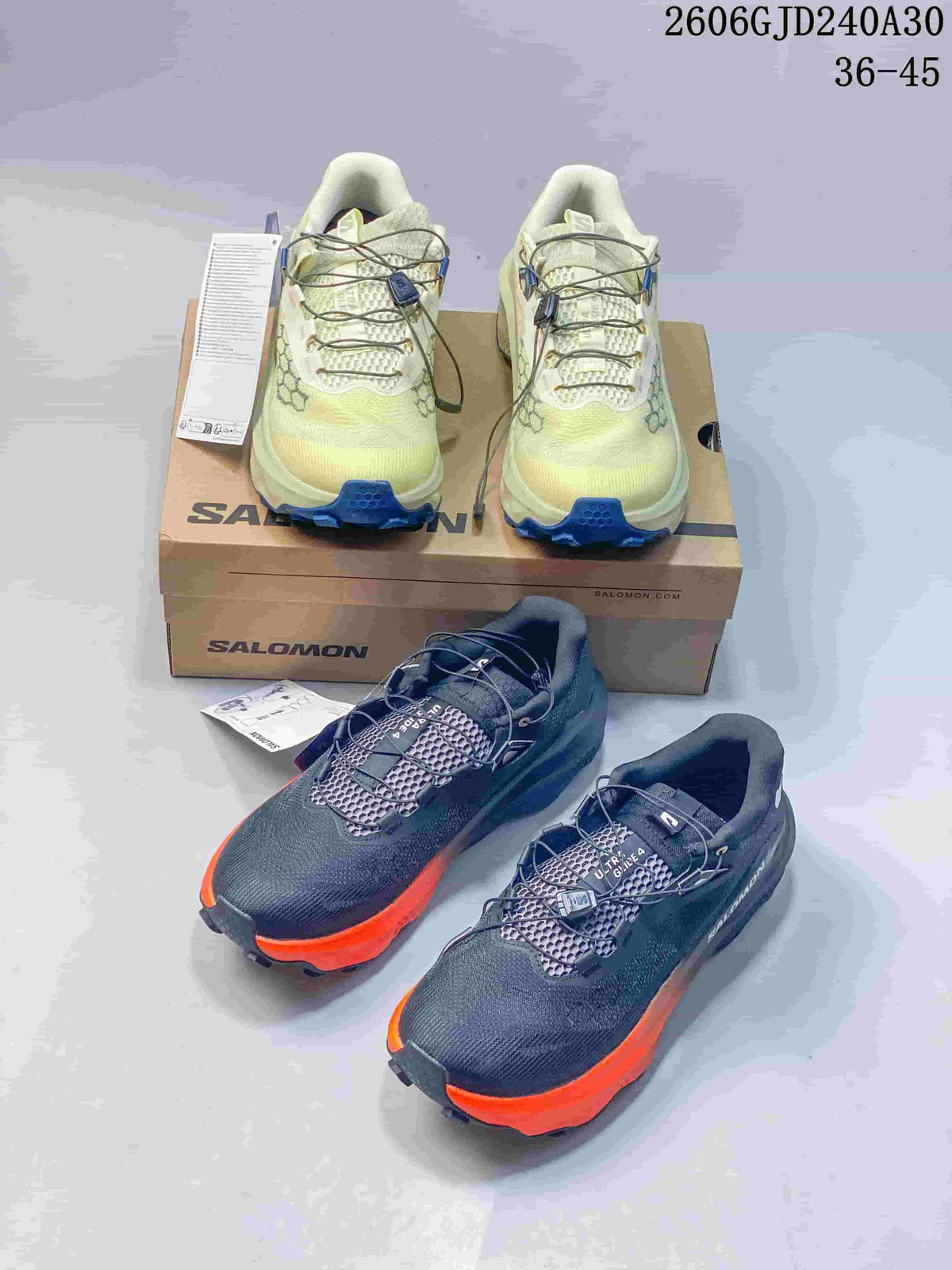 Front view of pale yellow and charcoal Salomon Ultra Glide 4 shoes with cord lacing